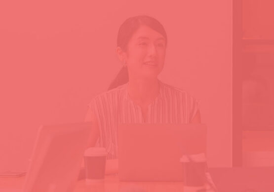 Professional woman smiling at meeting